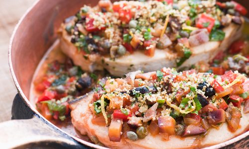 Close up of Baked Sicilian Swordfish in a Copper pan