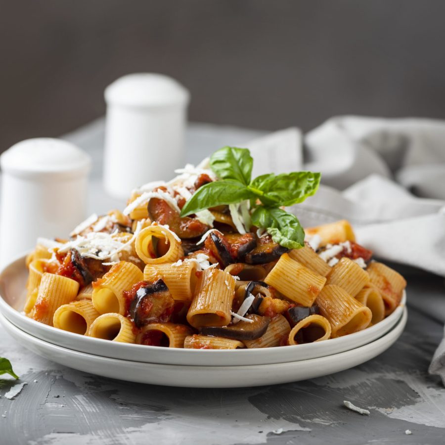 Traditional Sicilian dish Pasta alla Norma with eggplant and ricotta